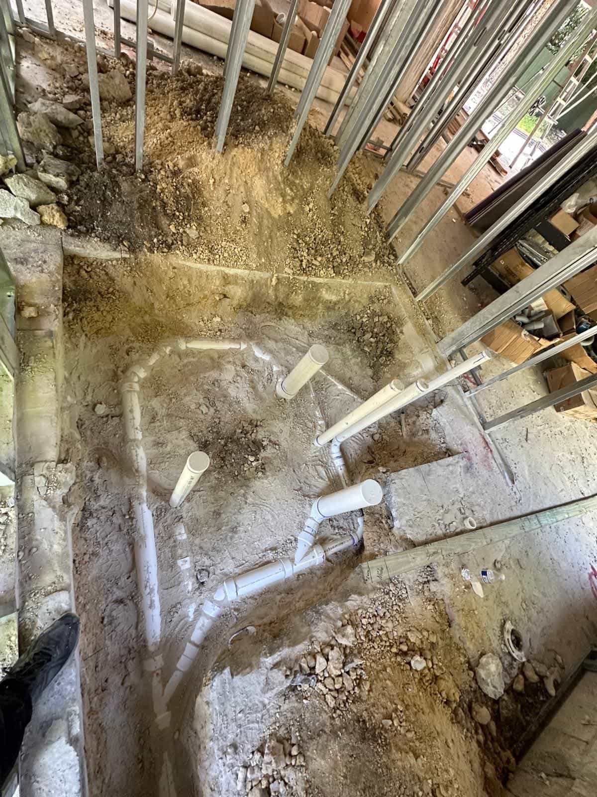Before and after of a Underground pipe assemply by a plumber in Coral Gables